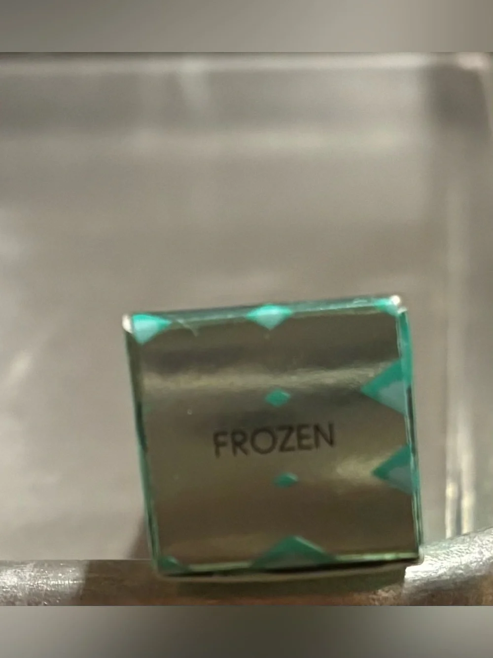 MAC Cosmetics Lipglass Gloss in shade Frozen a shimmery pink w blue reflect